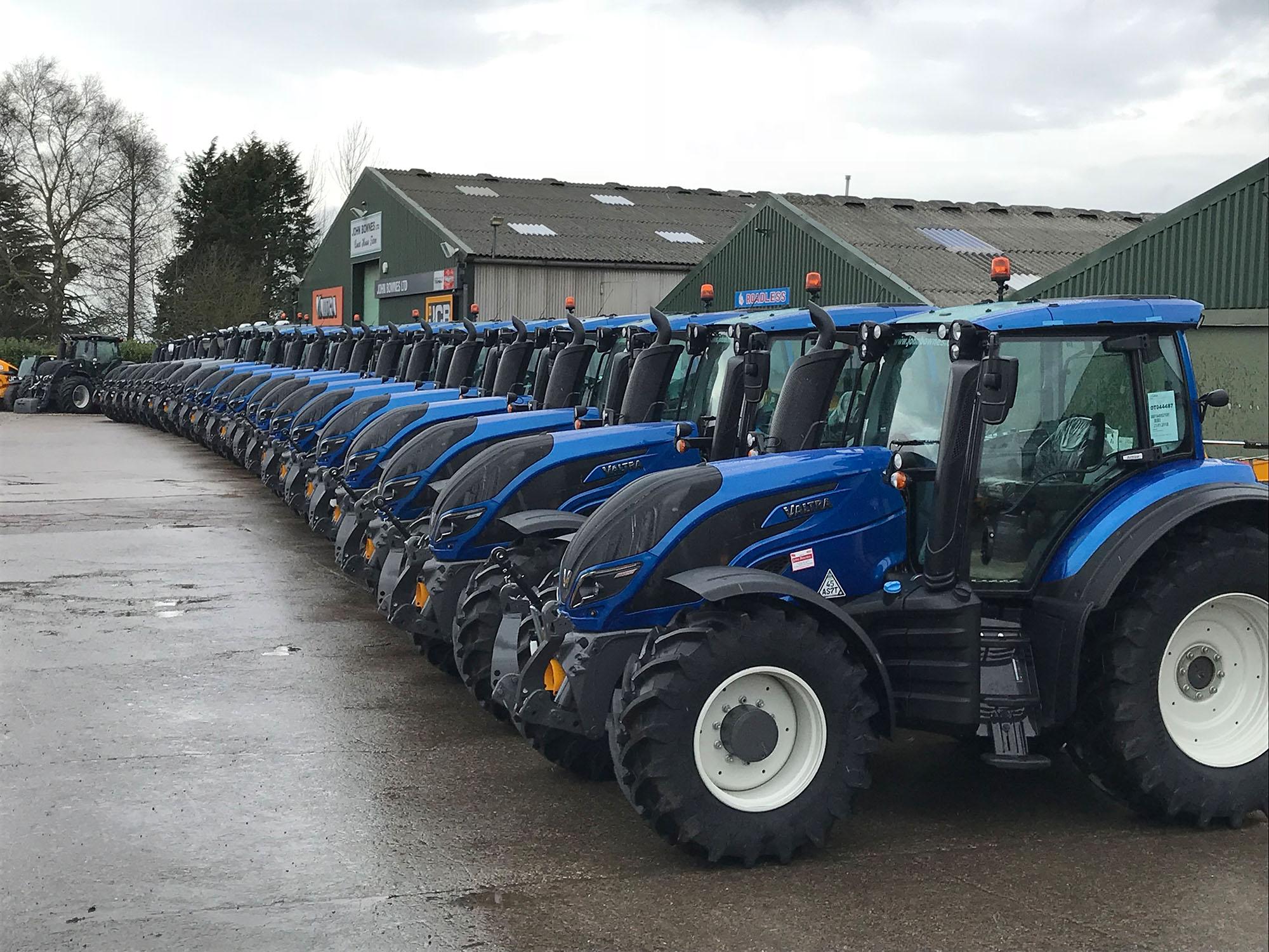 Line up of the new fleet of Valtra tractors at dealer John Bownes Ltd. Ready for hand over.